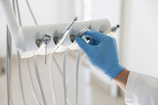 Professional Tooth Extraction technician working in Galena, KS
